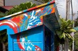 Top side view of bus shelter blue with swirls.