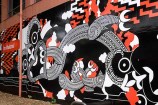 Black, white and red tupuna Maori mural.