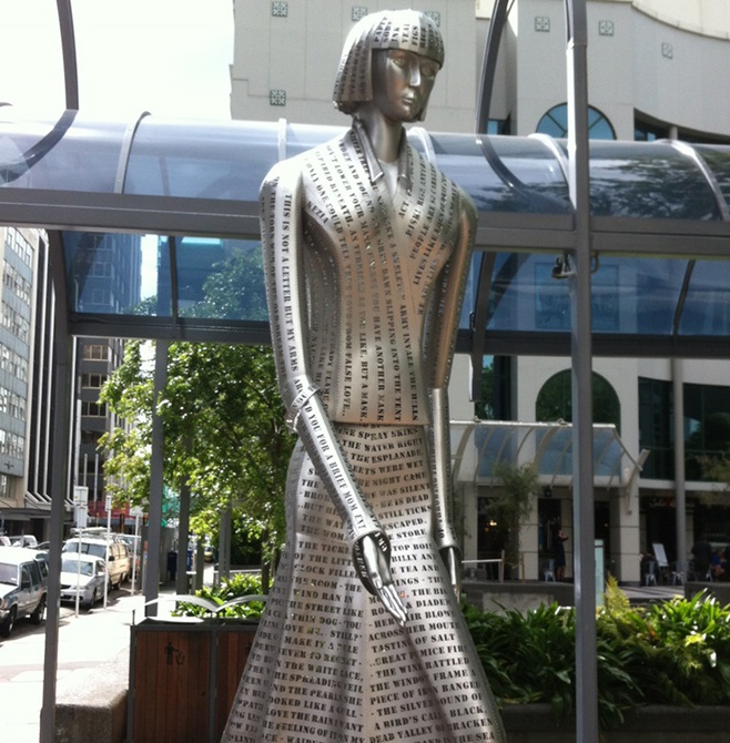 Woman of Words sculpture.
