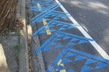 The blue niho taniwha design marks Waimāpihi Awa.