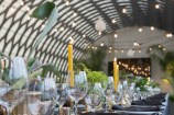 Dining table set for an event in the architecturally designed Kamala room.