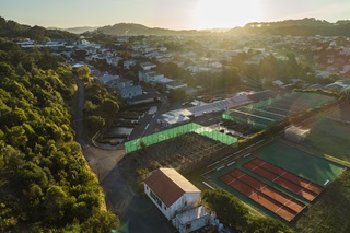 The sun rising over Berhampore Nursery. 