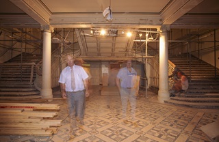 Two ghostly figures standing in the Town Hall in 1990. 