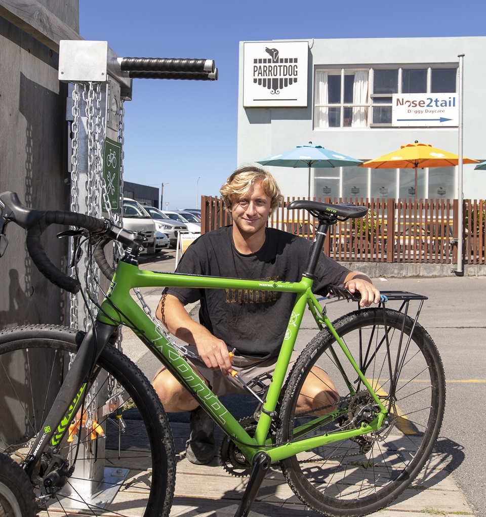 Image of staff member at Parrotdog with bike and facilities provided by workplace fund