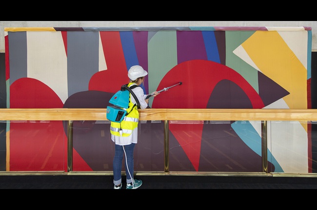 Massive artwork gets delicate spruce-up 