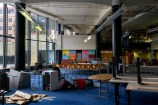Chairs, tables and desks stacked on top of each other in the Central Library ground level floor.