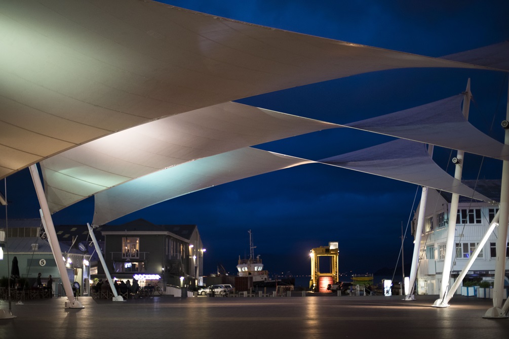 Queens Wharf sails lit up at night