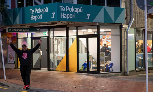 Te Pokapū Hapori exterior with Pastor Joe Serevi outside