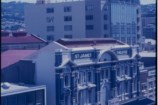 An aged photo of the outside of St James Theatre in the 1980s.