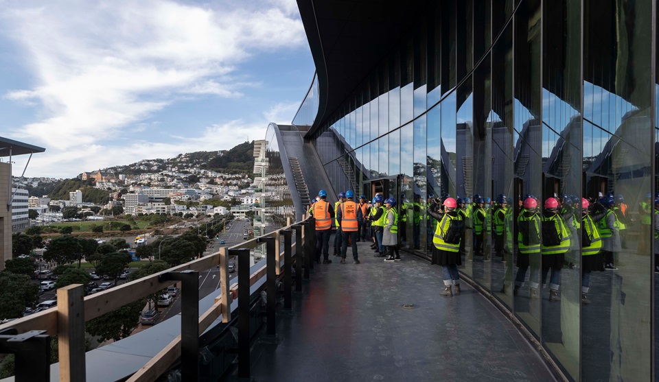 Takina Cable Street facing balcony with reflections of tour group