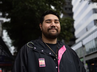 Person smiling at camera.