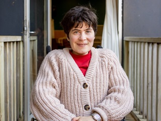 Person smiling at camera.
