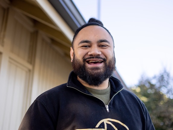 Person smiling at camera.