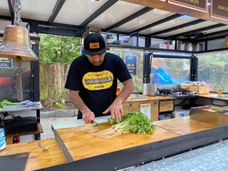 Man chopping coriander