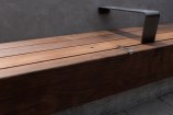 Detail of wooden bench and hand rail.