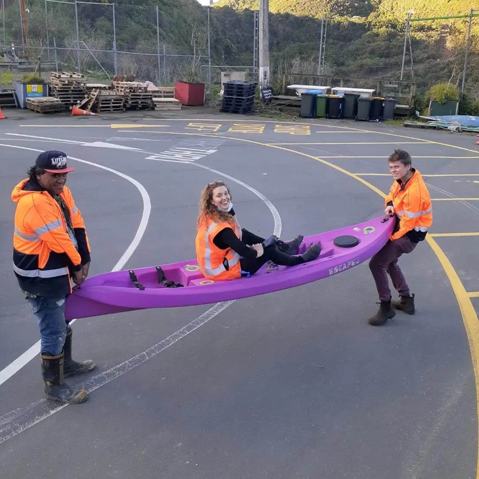 Tip Shop team with kayak recovered from the landfill.