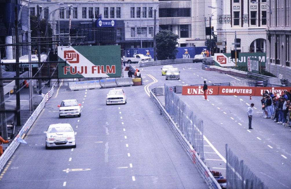 Cars on circuit during the Nissan Mobile race along the waterfront in 1989