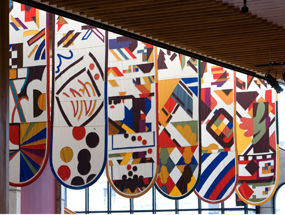 Image of banners hanging from the ceiling.