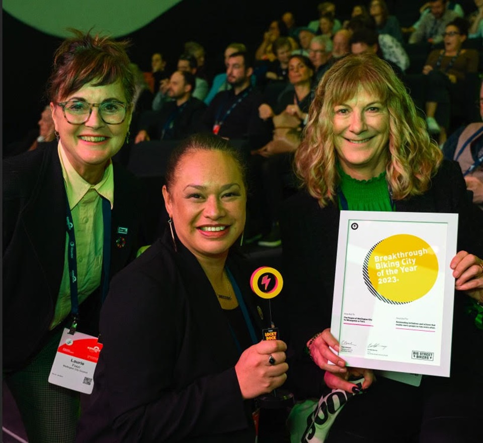 Deputy Mayor Laurie Foon, Mayor Tory Whanau and CEO Barbara McKerrow collect award for WCC