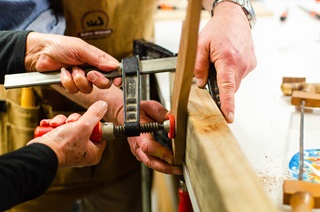 Close up of hands at work.