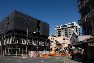 A construction site between buildings.