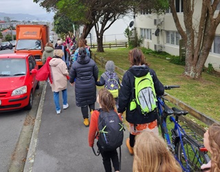 Group of kids walking to school.