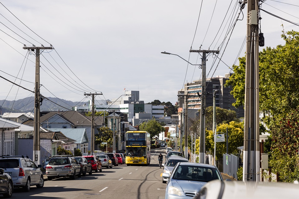 Bus passes bike on Rintoul Street