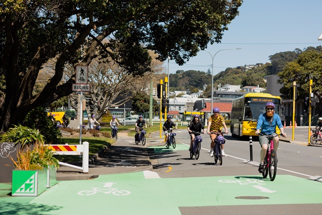 Students riding down a bike lane.