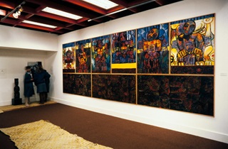 A series of bold paintings by Robyn Kahukiwa hanging in City Gallery. 