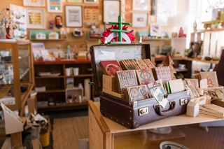 Shelves full of items at a gift shop.