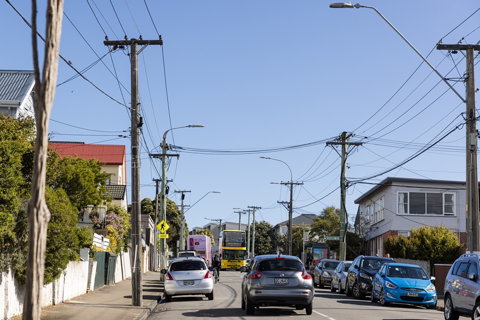 Buses making way for cars and bikes on narrow Rintoul Road in Newtown.