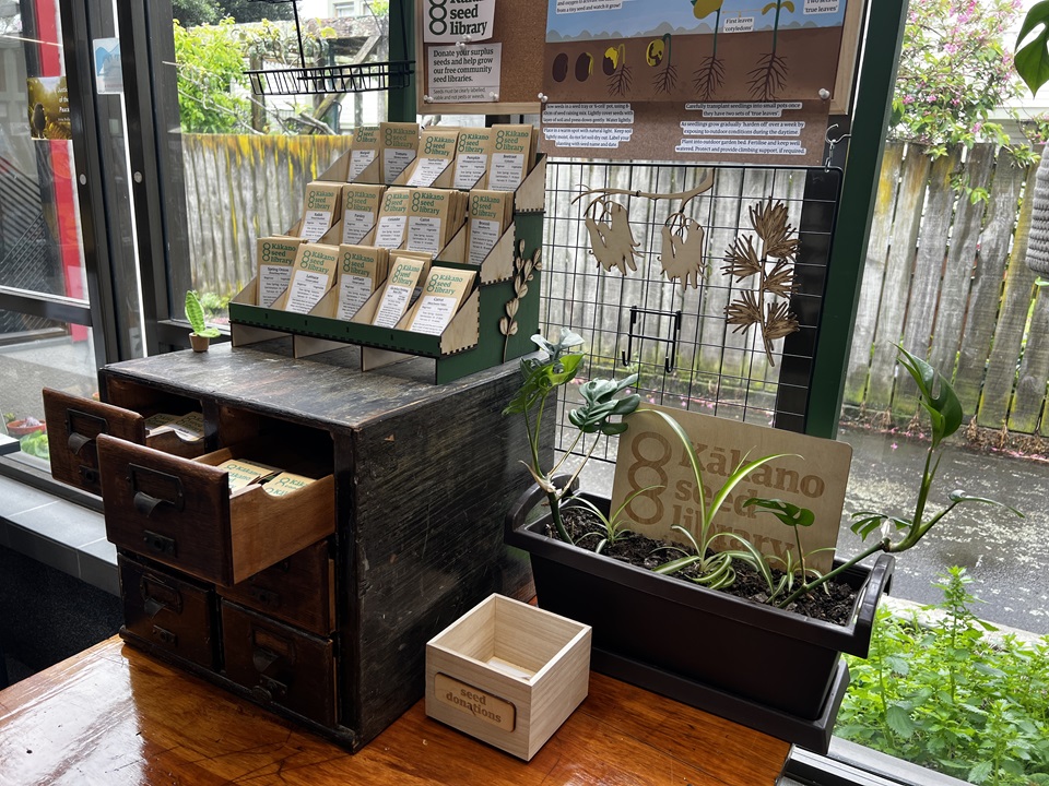 Wide angle view of table and packets of seeds on display at Newtown Library.