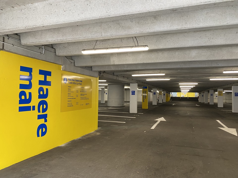 Entrance to Frank Kitts Park car park with signs and directions.