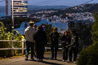 Students walking down an alleyway.