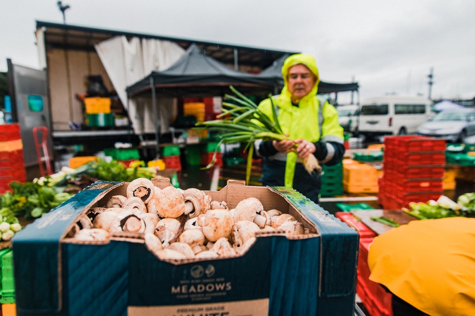 Harbourside Market vendor with food destined for Kaibosh food rescue.