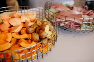 Hangi being prepared in trays