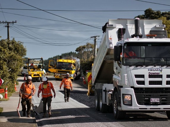 Image of road workers laying the chipseal