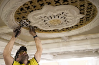 a National pressed metal contractor installing the pressed metal repair.