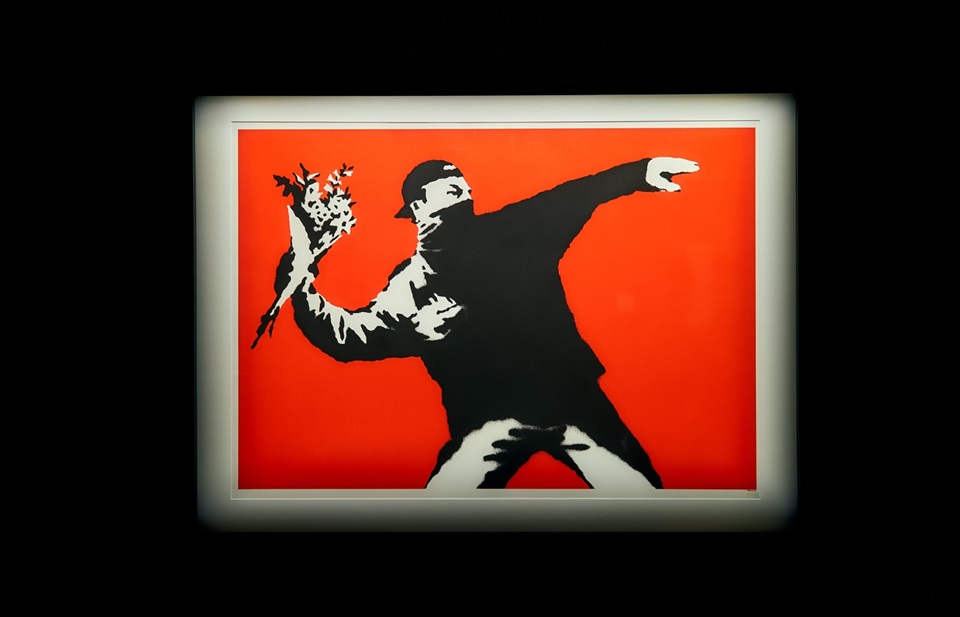 Flower thrower Banksy artwork at exhibition