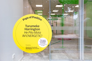 A decal on the window that says 'Turumeke Harrington He pito mata I’M ENERGETIC!'