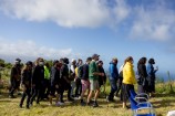 People gathered at the top of Tawatawa Reserve to celebrate the completion of the restoration of the pou
