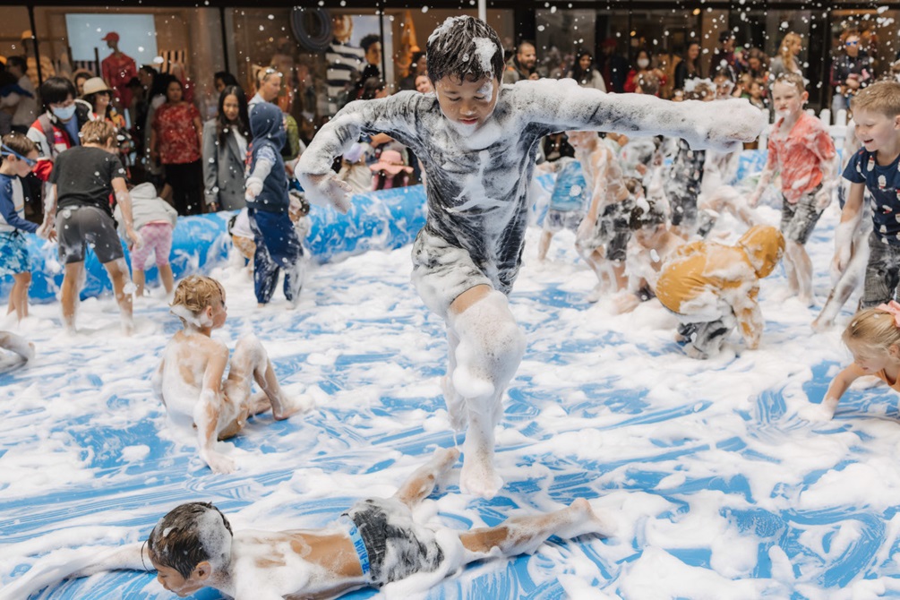 Children playing in a foam pit.