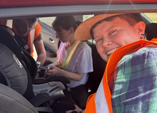 Car seat being checked by some of the Council's technicians.